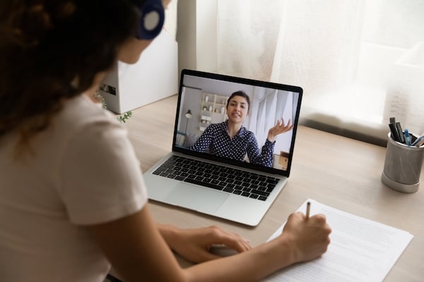 An image showing a behavioral healthcare provider during an EHR demo where they get answers about data security, clinical documentation, and collaboration with other healthcare providers at a medical practice