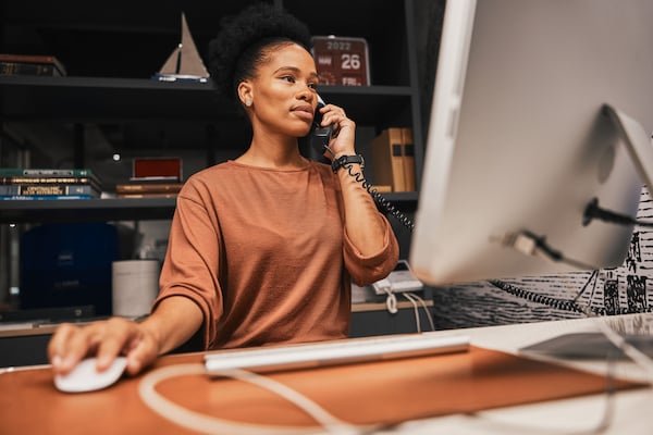 Based on the results from an automated verification check, a clinic administrator proactively contacts a patient to discuss their eligibility status and other options to support patient payment