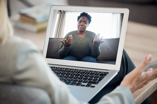 A patient dealing with behavioral health conditions connects with mental health professionals virtually to support positive clinical outcomes