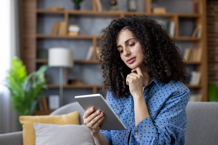 woman reading about ehr for therapists