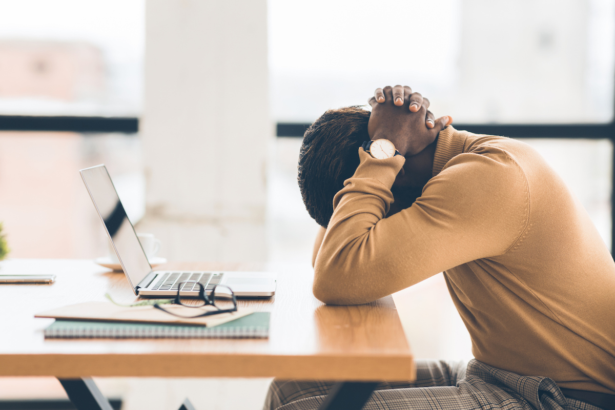 A mental health provider experiences therapist burnout, showing signs of emotional exhaustion in the workplace that bleeds into their personal life