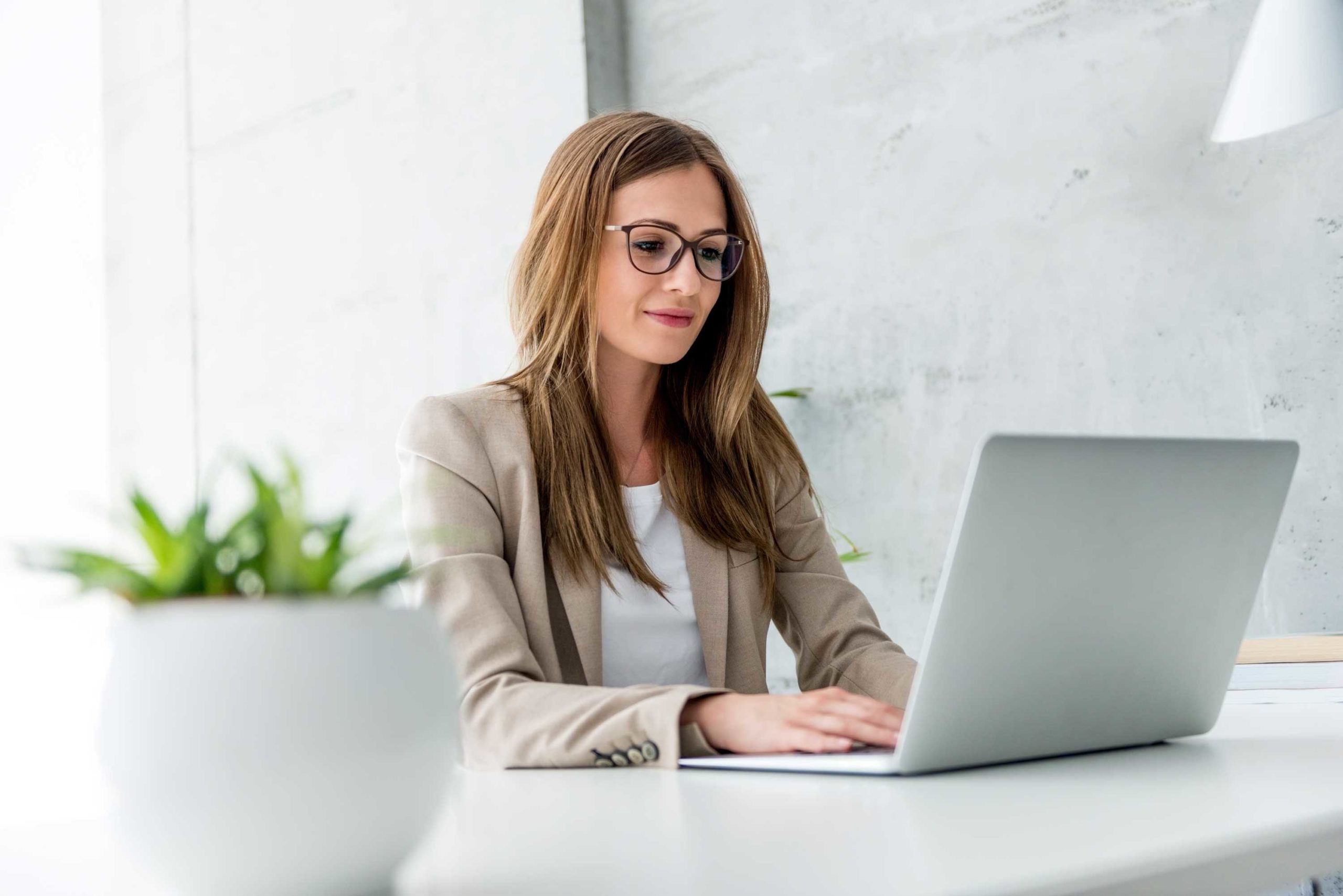 laptop user using Clinic Tracker